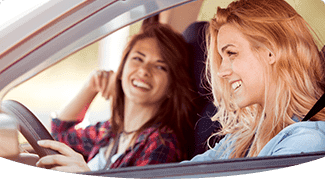 happy teens in car