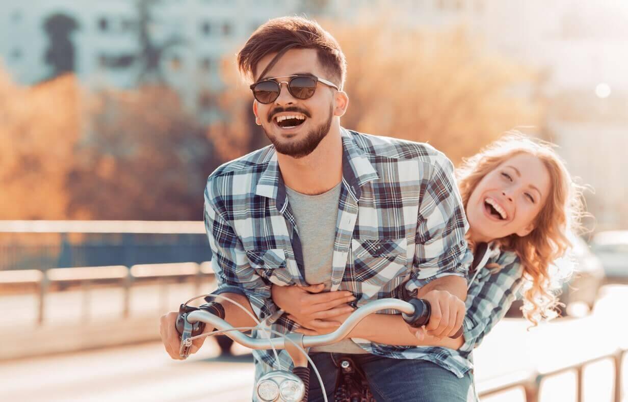 Happy couple on bike