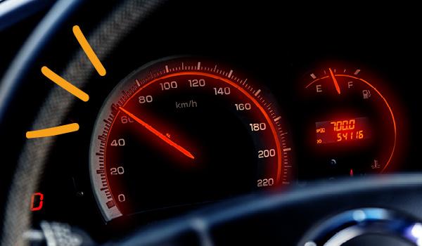 Speedometer on car dashboard