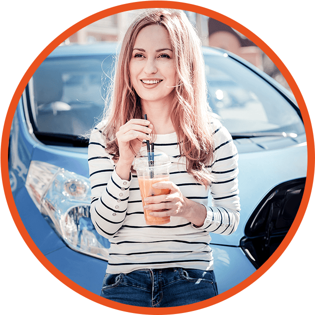 Happy young girl with electric car